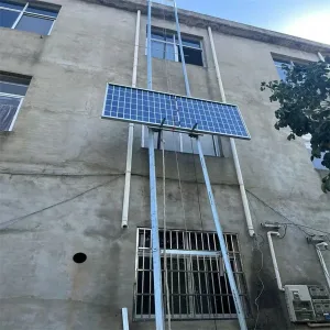 Elevador eléctrico de acero altura máxima 18 m con carro móvil y mando a distancia para elevación de mercancías y paneles solares fotovoltaicos